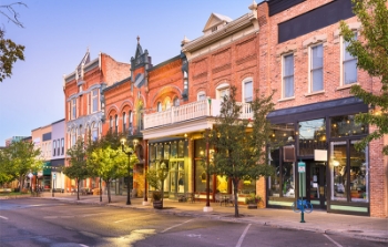 A downtown during the day with brick buildings